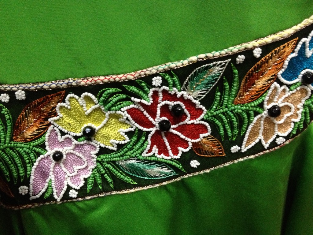 I couldn't resist posting the beading detail from one of Nicole's dresses.  You should go look at the fashion show, but you won't be able to see all the wonderful details in her dresses!