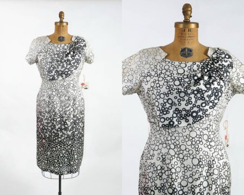The use of the fabric print on this 1950's dress is pretty fascinating - excellent neckline, as well
