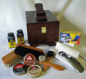 My dad has had one of these mega shoe shine kits with the swanky wooden box for as long as I can remember.  When you have to special order extra narrow shoes, replacing them can get expensive.  I used to consider it a privilege to sit down with my dad and help him polish his shoes (is that weird?) and I always loved the results - shiny!
