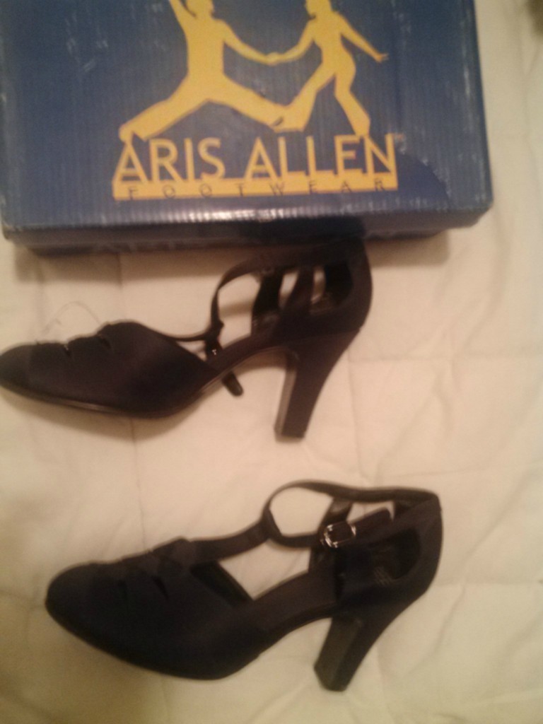 Black t-strap heels, size 8, bidding starts at $14.99