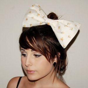 This bow looks like it's about the right size. :)  Courtesy of Whispy Love on Etsy.