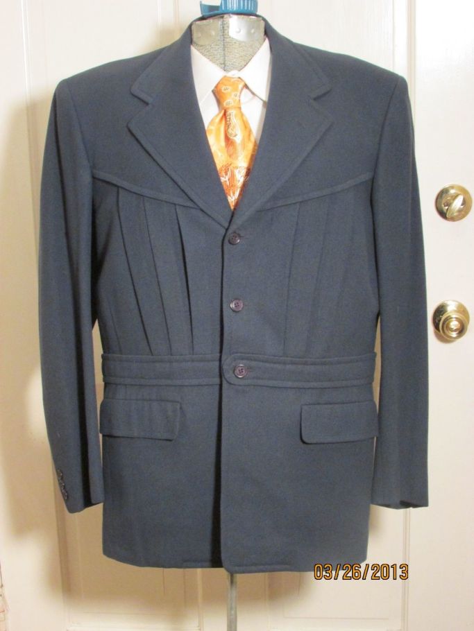 Seriously gorgeous brown wool with colored flecks jacket, dated November 19, 1941, bidding around $100 right now...