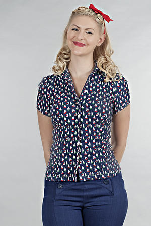 For those days when you are washing your romper, you can settle for this adorable sailboat blouse.