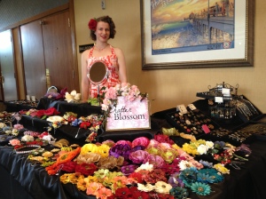 ChatterBlossom's colorful display - vintage millinery to the left