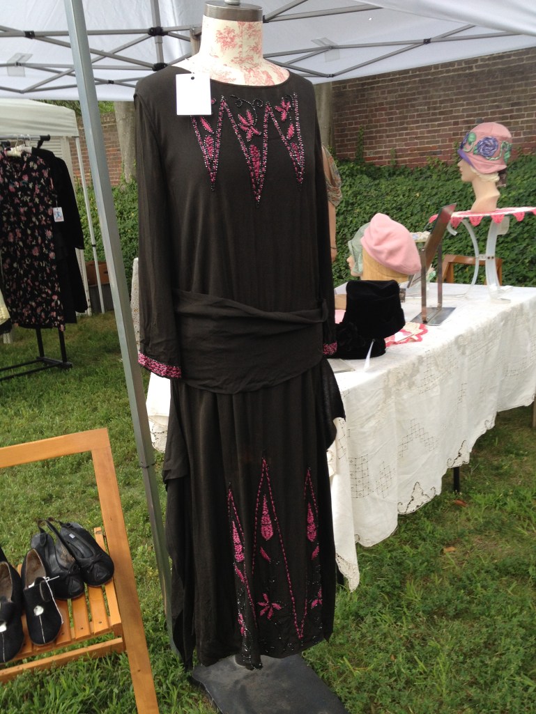 1920's goodness from Machine Dance Vintage, with Brooksy hats peeking out from behind