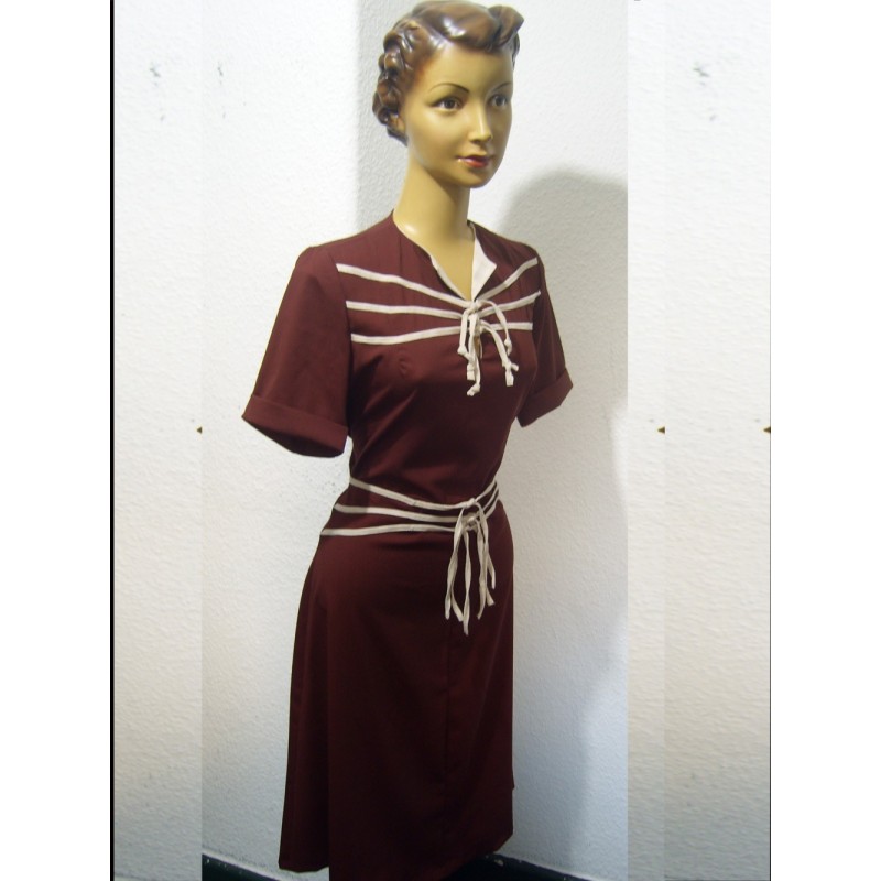 Margie dress - I love the placement of the trim, to draw the eye up toward the neckline and also emphasizing the waist, moving toward the hips.